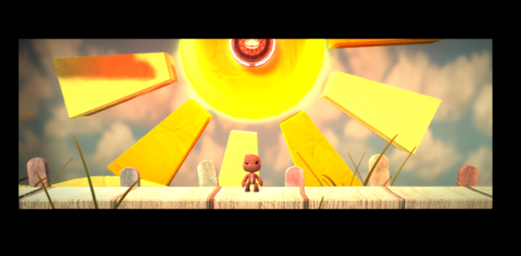Sackboy standing in front of a sunburst